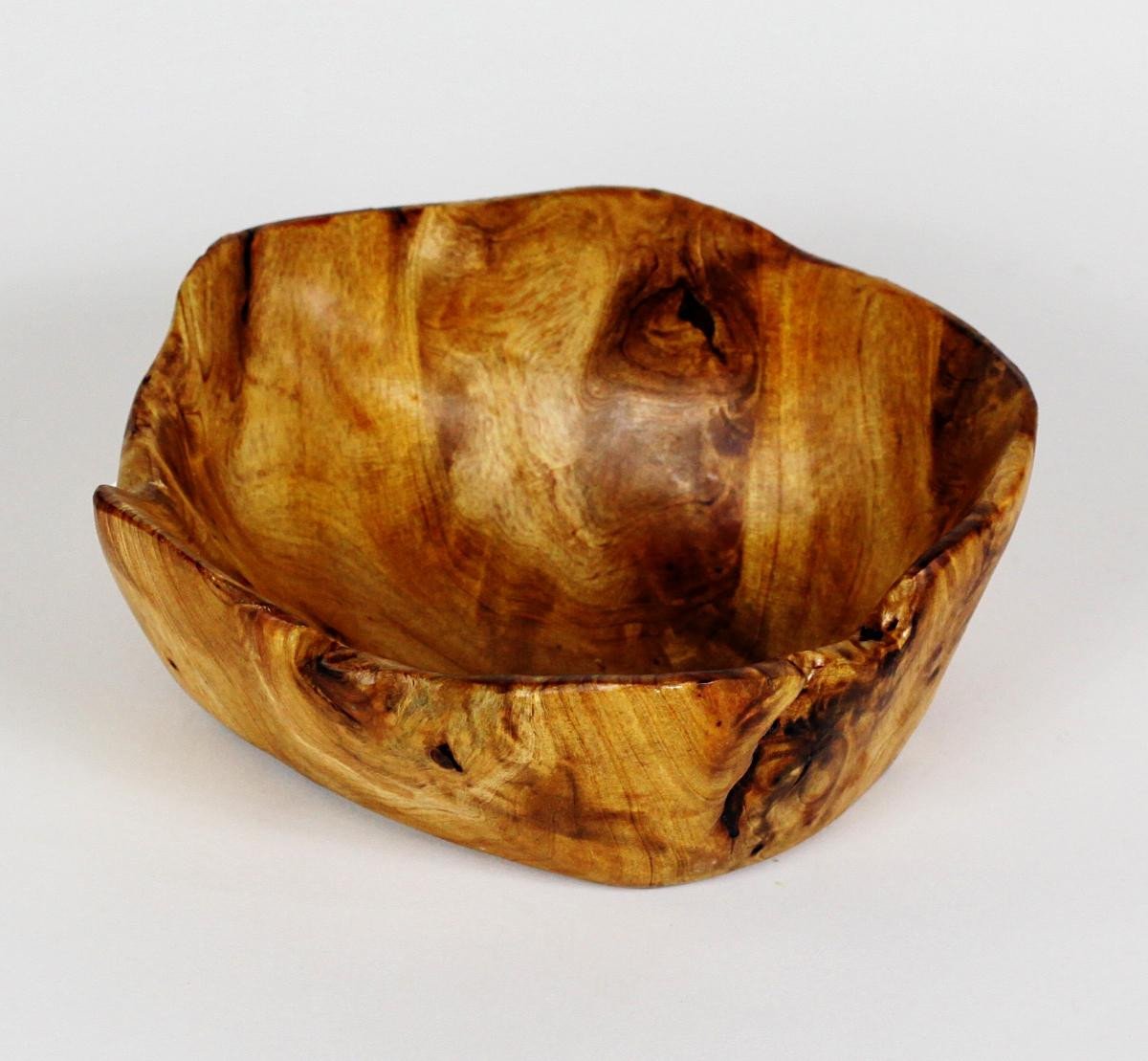 FUNCTIONAL ART is the best way to describe Greener Valley's stunning collection of stumps and roots that have been handcrafted into beautiful wine holders, cheese boards, platters, bowls and stools. Handcrafted from the roots and stumps of the Asian Cypress known as Shan Mu. These beautiful stools function equally well as a stool, end table or plant stand. Each piece is absolutely unique. This stool measures 24" high.