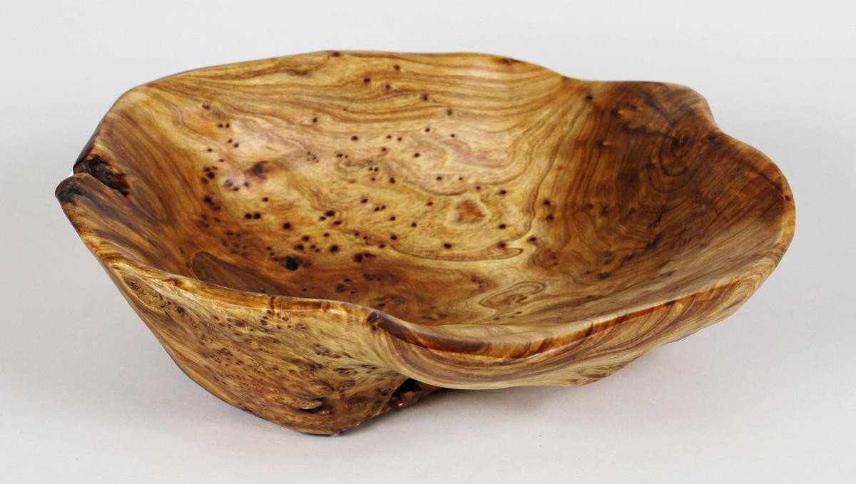 FUNCTIONAL ART is the best way to describe Greener Valley's stunning collection of stumps and roots that have been handcrafted into beautiful wine holders, cheese boards, platters, bowls and stools. Handcrafted from the roots and stumps of the Asian Cypress known as Shan Mu. These beautiful stools function equally well as a stool, end table or plant stand. Each piece is absolutely unique. This stool measures 24" high.