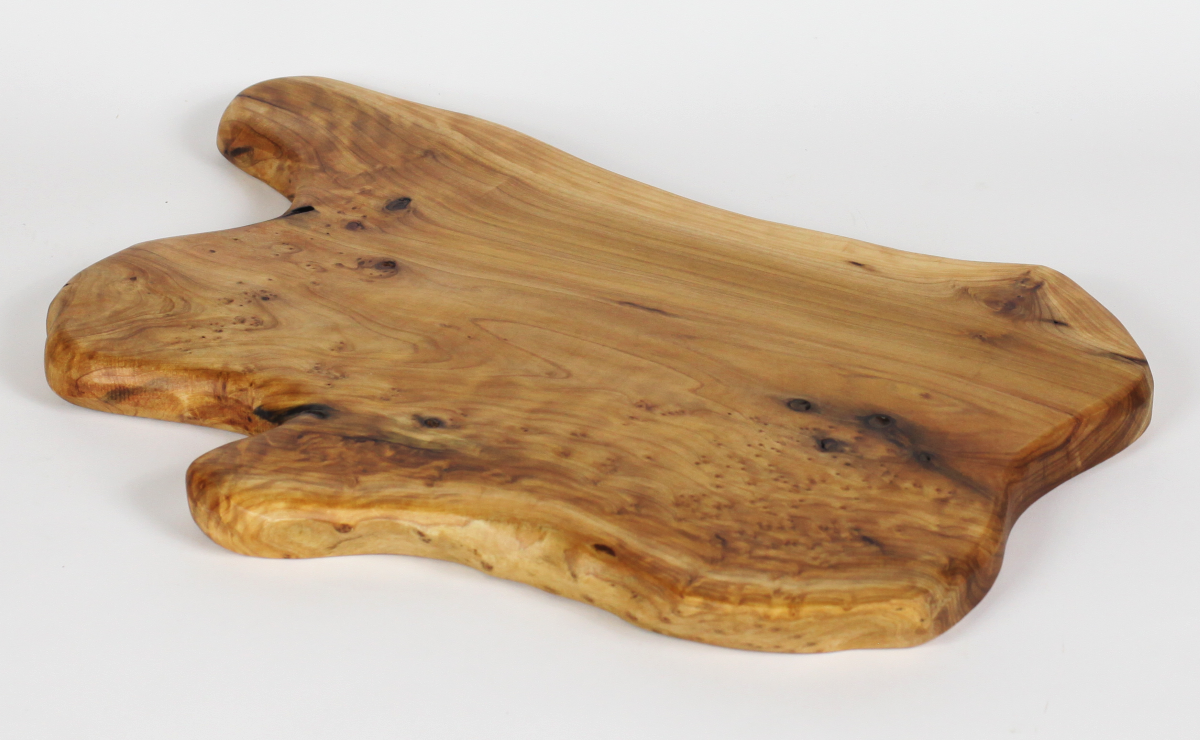 FUNCTIONAL ART is the best way to describe Greener Valley's stunning collection of stumps and roots that have been handcrafted into beautiful wine holders, cheese boards, platters, bowls and stools. Handcrafted from the roots and stumps of the Asian Cypress known as Shan Mu. These beautiful stools function equally well as a stool, end table or plant stand. Each piece is absolutely unique. This stool measures 24" high.