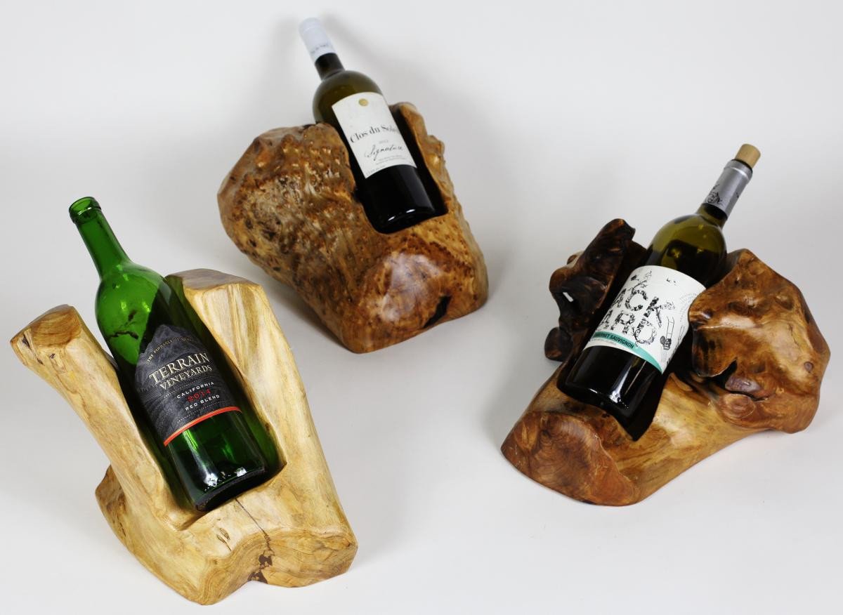 FUNCTIONAL ART is the best way to describe Greener Valley's stunning collection of stumps and roots that have been handcrafted into beautiful wine holders, cheese boards, platters, bowls and stools. Handcrafted from the roots and stumps of the Asian Cypress known as Shan Mu. These beautiful stools function equally well as a stool, end table or plant stand. Each piece is absolutely unique. This stool measures 24" high.