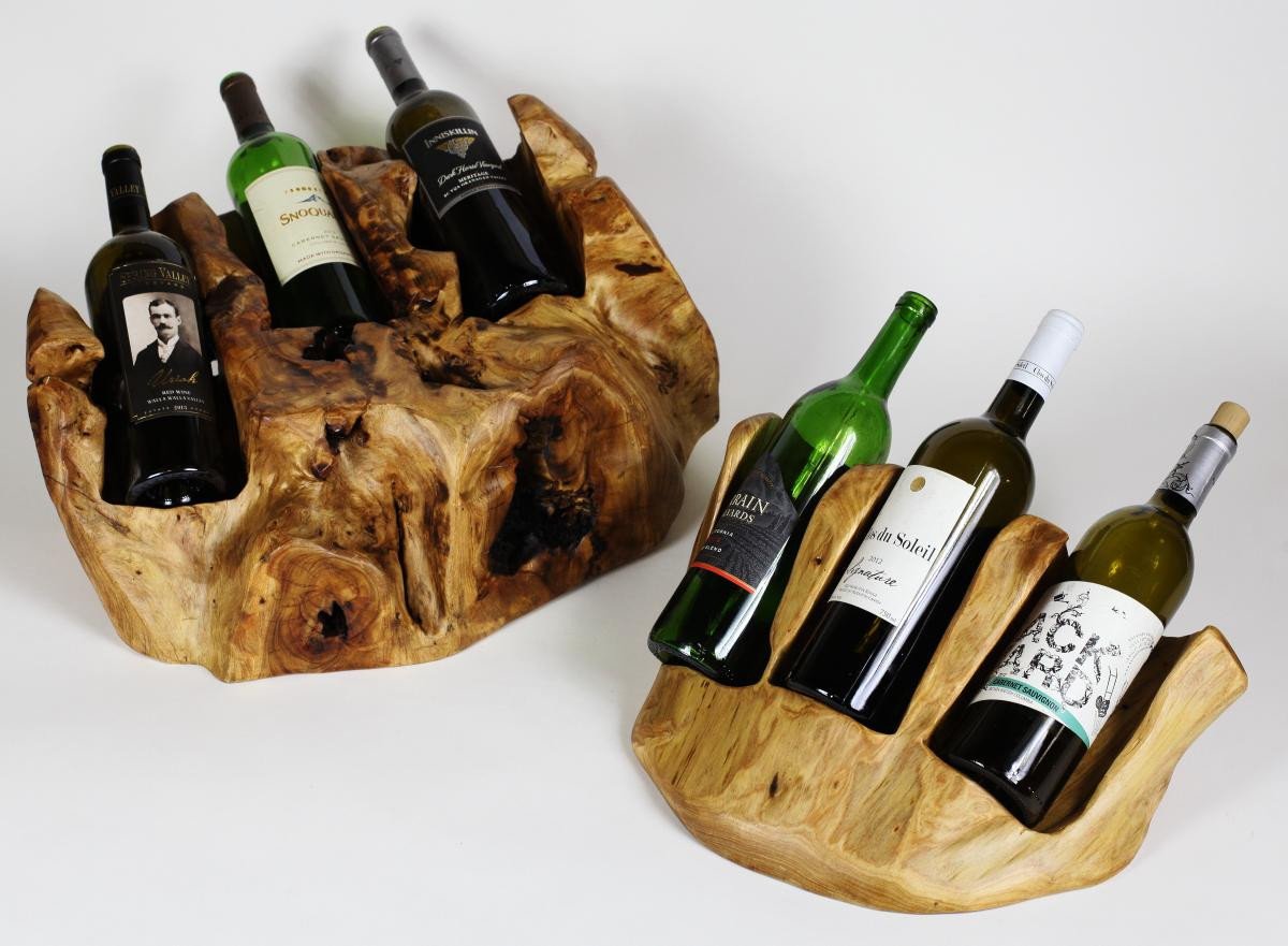 FUNCTIONAL ART is the best way to describe Greener Valley's stunning collection of stumps and roots that have been handcrafted into beautiful wine holders, cheese boards, platters, bowls and stools. Handcrafted from the roots and stumps of the Asian Cypress known as Shan Mu. These beautiful stools function equally well as a stool, end table or plant stand. Each piece is absolutely unique. This stool measures 24" high.