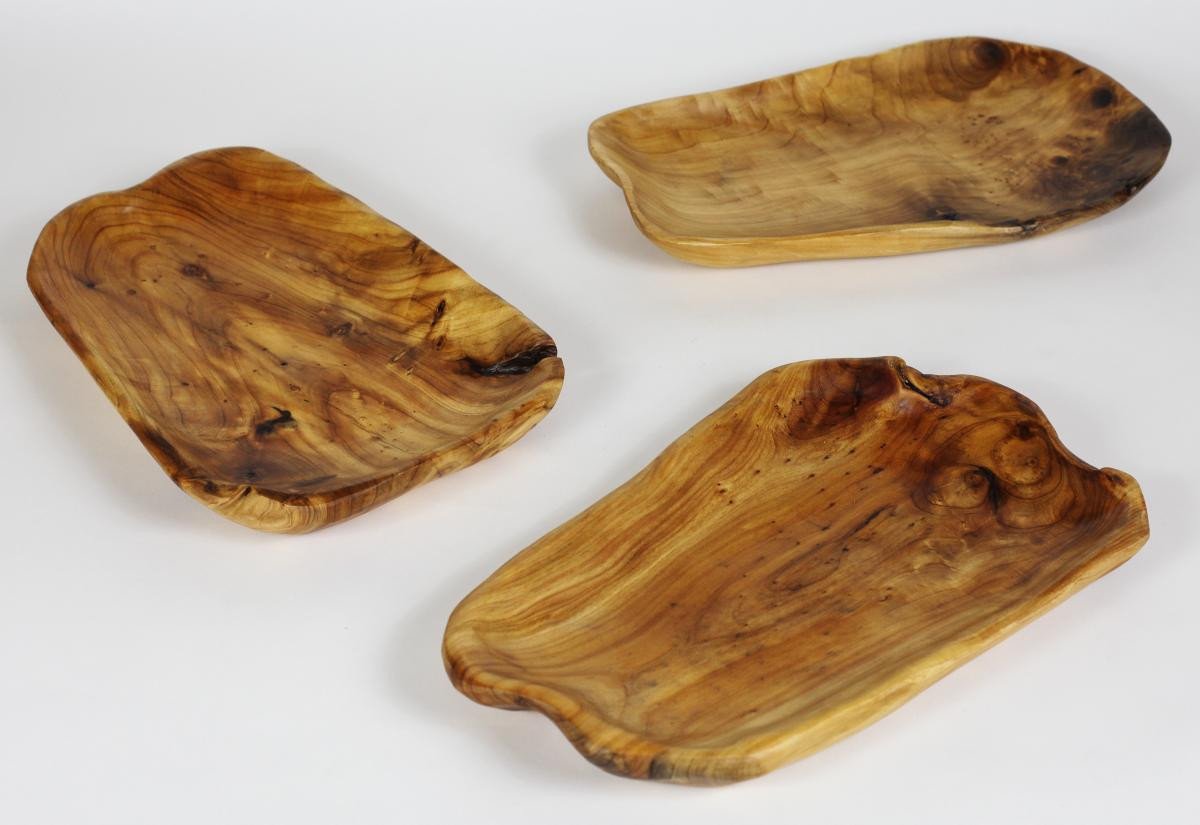 FUNCTIONAL ART is the best way to describe Greener Valley's stunning collection of stumps and roots that have been handcrafted into beautiful wine holders, cheese boards, platters, bowls and stools. Handcrafted from the roots and stumps of the Asian Cypress known as Shan Mu. These beautiful stools function equally well as a stool, end table or plant stand. Each piece is absolutely unique. This stool measures 24" high.