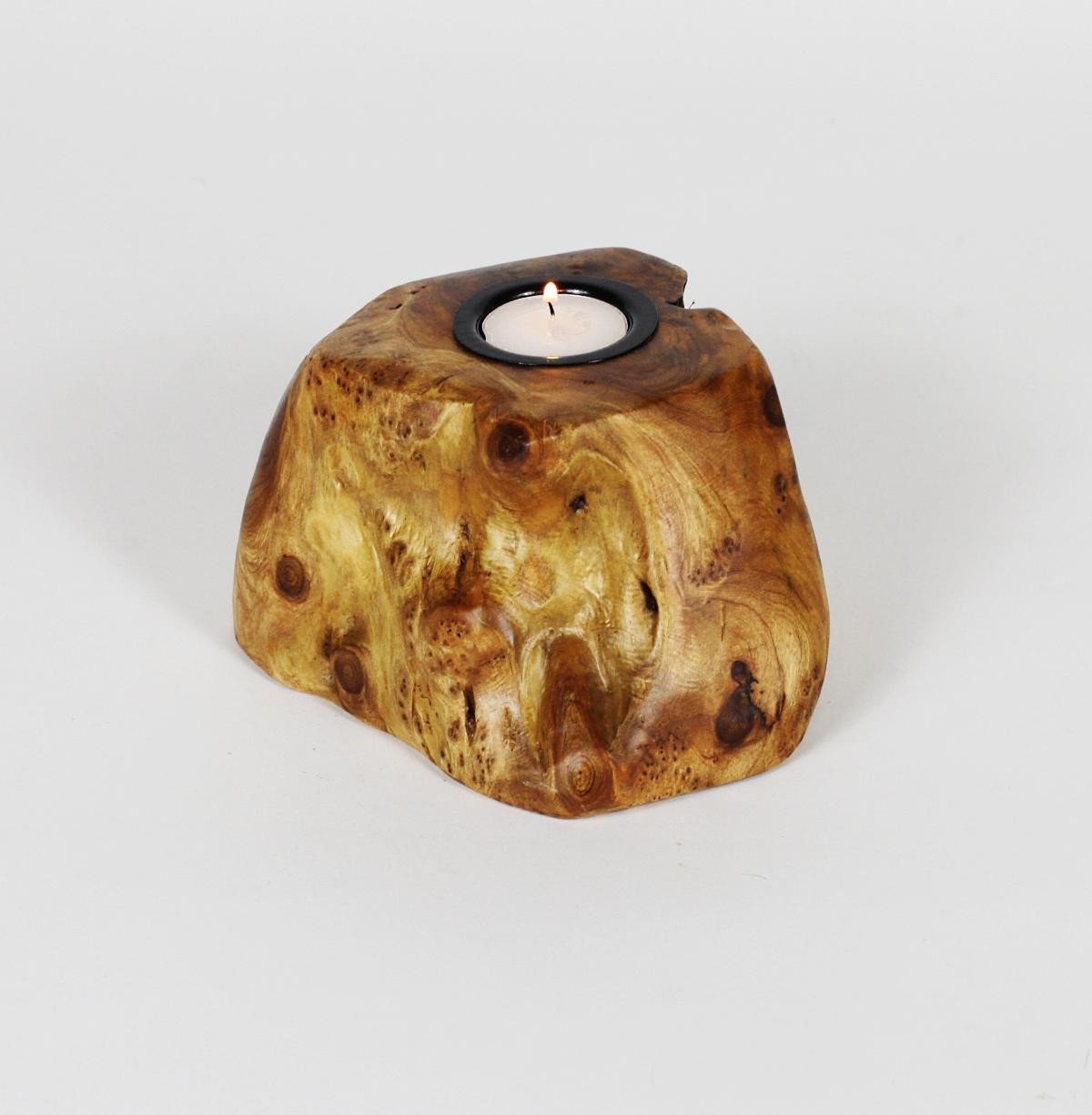 FUNCTIONAL ART is the best way to describe Greener Valley's stunning collection of stumps and roots that have been handcrafted into beautiful wine holders, cheese boards, platters, bowls and stools. Handcrafted from the roots and stumps of the Asian Cypress known as Shan Mu. These beautiful stools function equally well as a stool, end table or plant stand. Each piece is absolutely unique. This stool measures 24" high.