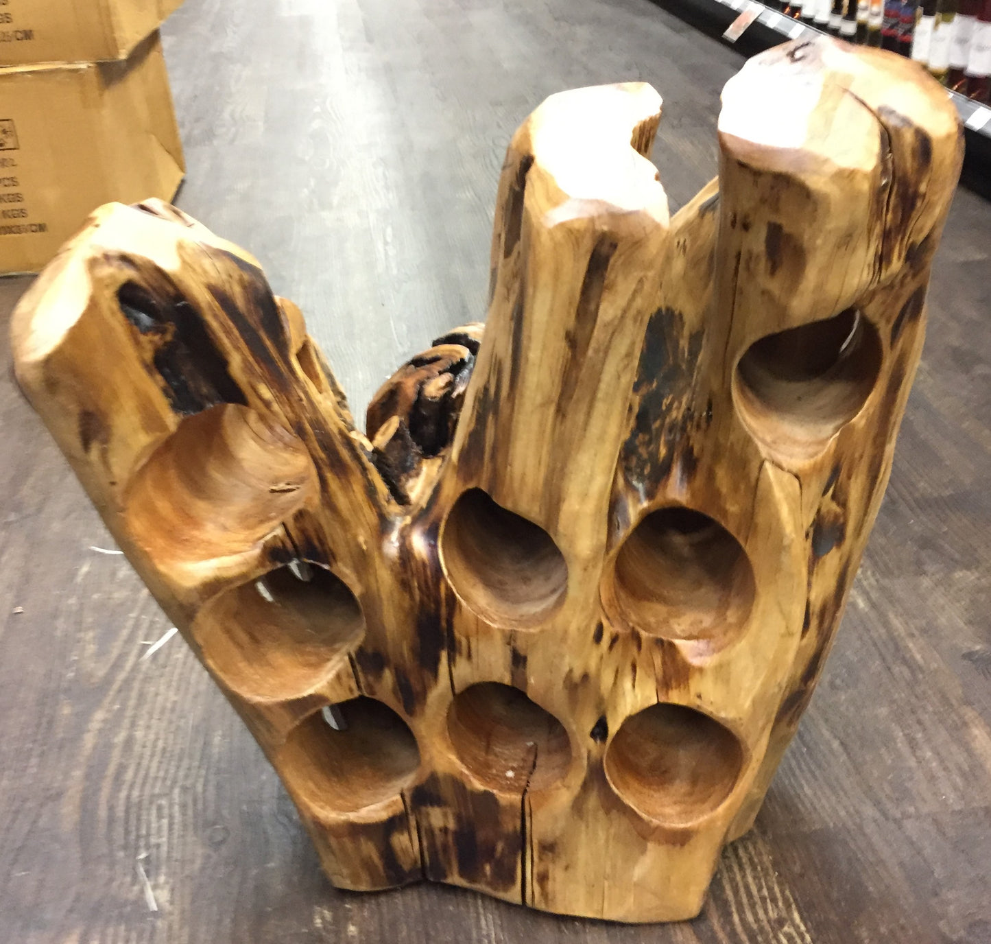 FUNCTIONAL ART is the best way to describe Greener Valley's stunning collection of stumps and roots that have been handcrafted into beautiful wine holders, cheese boards, platters, bowls and stools. Handcrafted from the roots and stumps of the Asian Cypress known as Shan Mu. These beautiful stools function equally well as a stool, end table or plant stand. Each piece is absolutely unique. This stool measures 24" high.