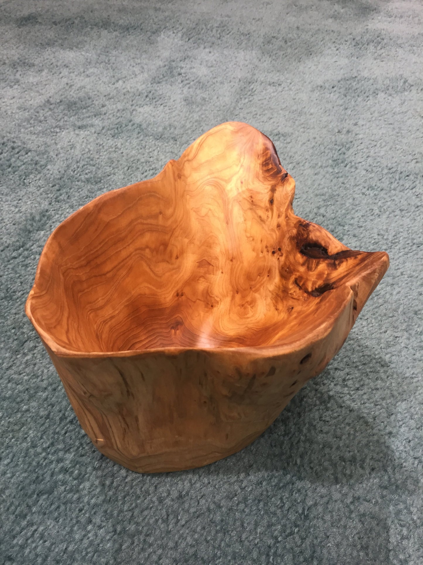 FUNCTIONAL ART is the best way to describe Greener Valley's stunning collection of stumps and roots that have been handcrafted into beautiful wine holders, cheese boards, platters, bowls and stools. Handcrafted from the roots and stumps of the Asian Cypress known as Shan Mu. These beautiful stools function equally well as a stool, end table or plant stand. Each piece is absolutely unique. This stool measures 24" high.