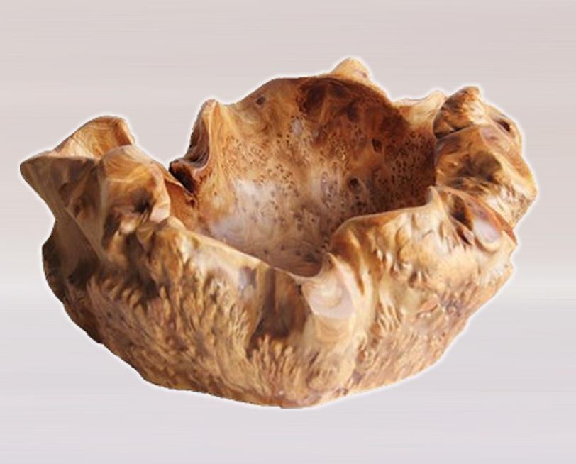 FUNCTIONAL ART is the best way to describe Greener Valley's stunning collection of stumps and roots that have been handcrafted into beautiful wine holders, cheese boards, platters, bowls and stools. Handcrafted from the roots and stumps of the Asian Cypress known as Shan Mu. These beautiful stools function equally well as a stool, end table or plant stand. Each piece is absolutely unique. This stool measures 24" high.