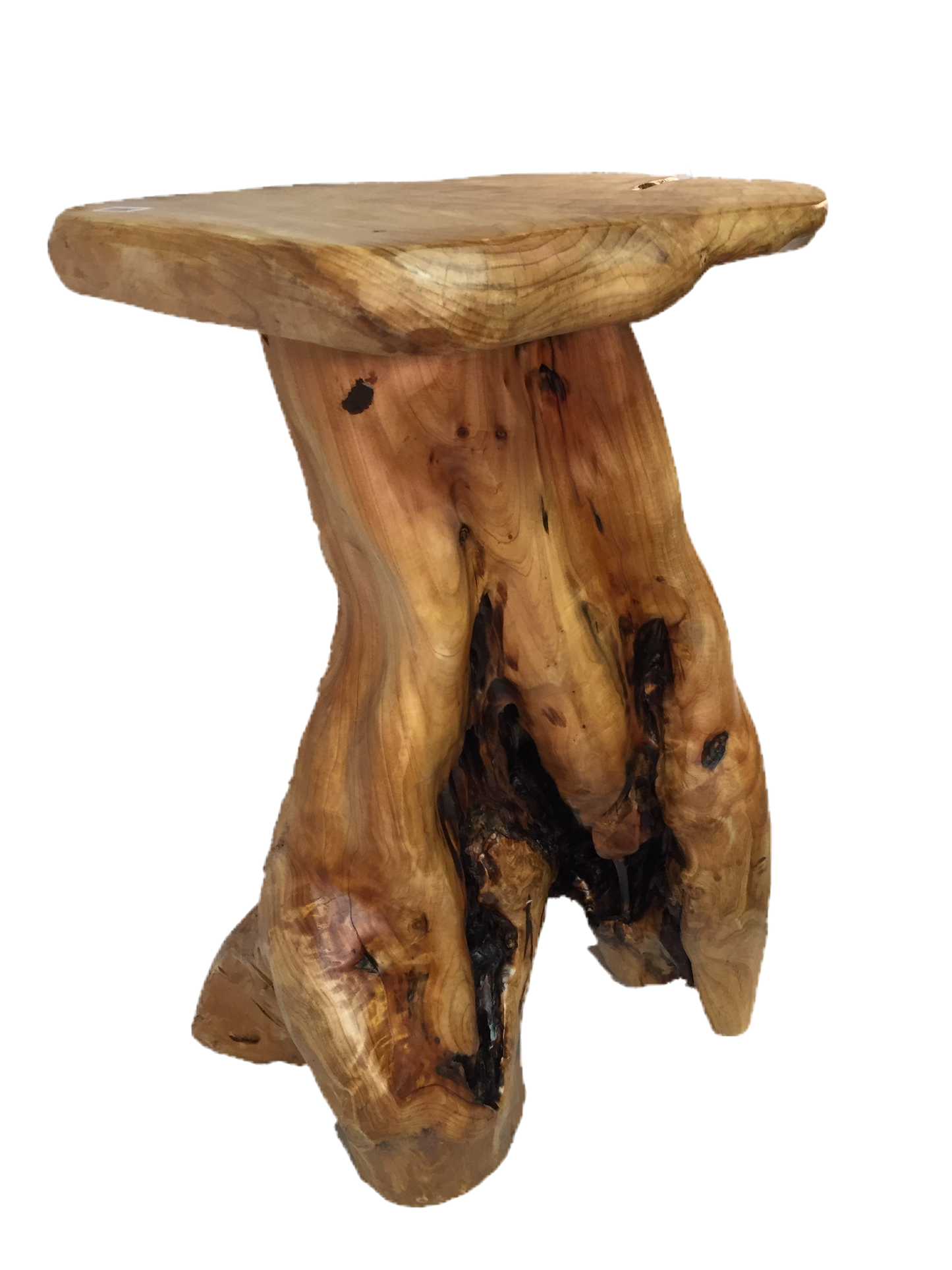 FUNCTIONAL ART is the best way to describe Greener Valley's stunning collection of stumps and roots that have been handcrafted into beautiful wine holders, cheese boards, platters, bowls and stools. Handcrafted from the roots and stumps of the Asian Cypress known as Shan Mu. These beautiful stools function equally well as a stool, end table or plant stand. Each piece is absolutely unique. This stool measures 24" high.