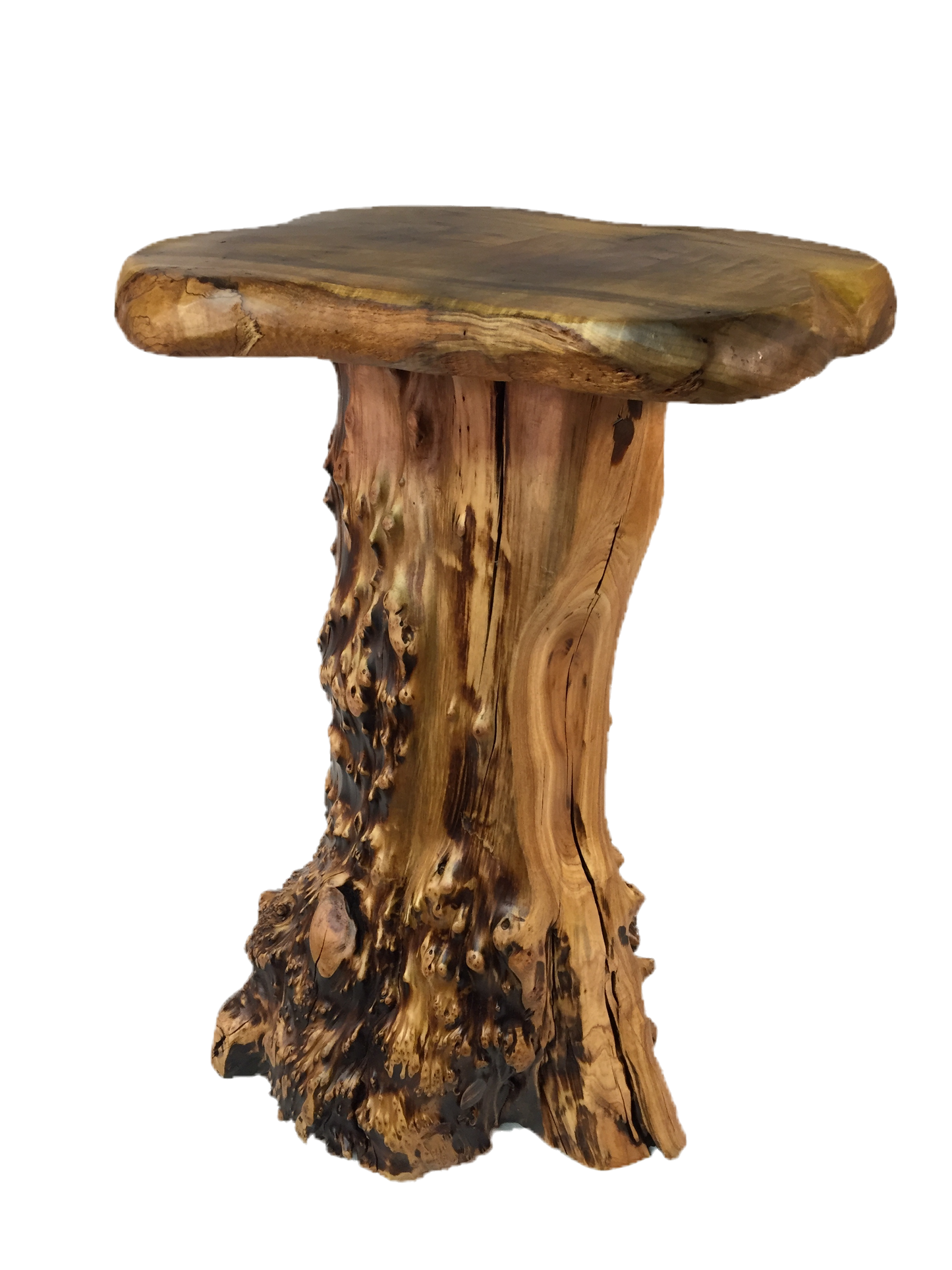 FUNCTIONAL ART is the best way to describe Greener Valley's stunning collection of stumps and roots that have been handcrafted into beautiful wine holders, cheese boards, platters, bowls and stools. Handcrafted from the roots and stumps of the Asian Cypress known as Shan Mu. These beautiful stools function equally well as a stool, end table or plant stand. Each piece is absolutely unique. This stool measures 24" high.