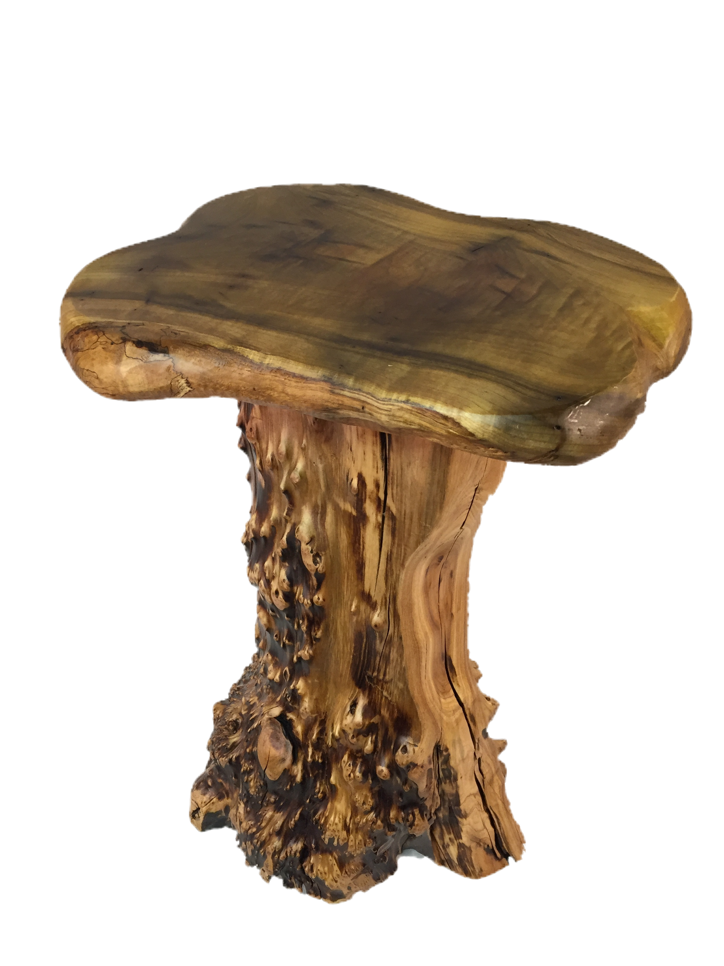 FUNCTIONAL ART is the best way to describe Greener Valley's stunning collection of stumps and roots that have been handcrafted into beautiful wine holders, cheese boards, platters, bowls and stools. Handcrafted from the roots and stumps of the Asian Cypress known as Shan Mu. These beautiful stools function equally well as a stool, end table or plant stand. Each piece is absolutely unique. This stool measures 24" high.