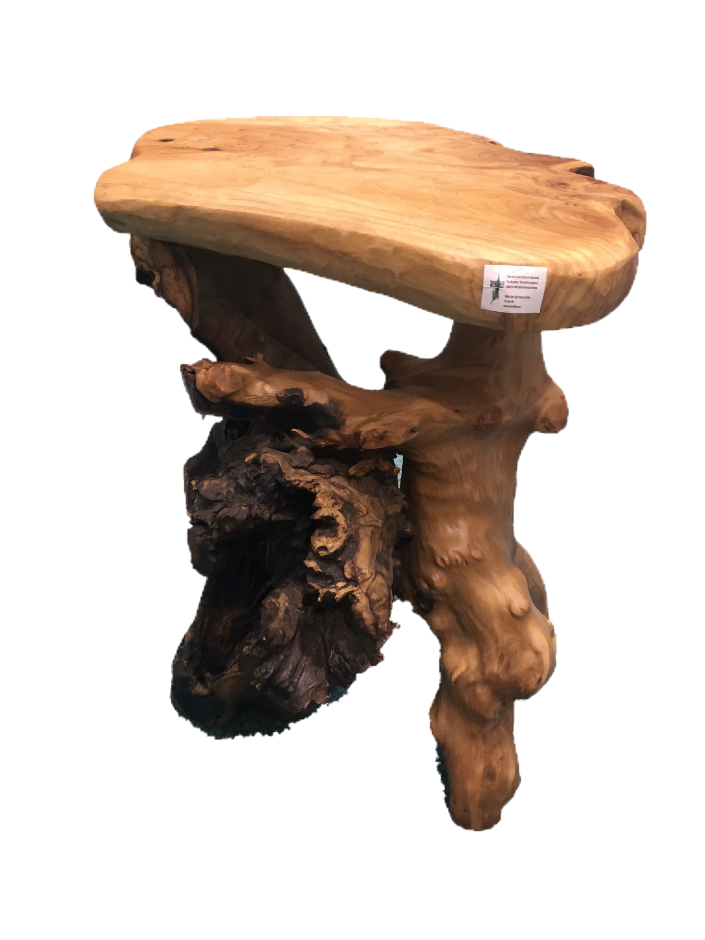 FUNCTIONAL ART is the best way to describe Greener Valley's stunning collection of stumps and roots that have been handcrafted into beautiful wine holders, cheese boards, platters, bowls and stools. Handcrafted from the roots and stumps of the Asian Cypress known as Shan Mu. These beautiful stools function equally well as a stool, end table or plant stand. Each piece is absolutely unique. This stool measures 24" high.