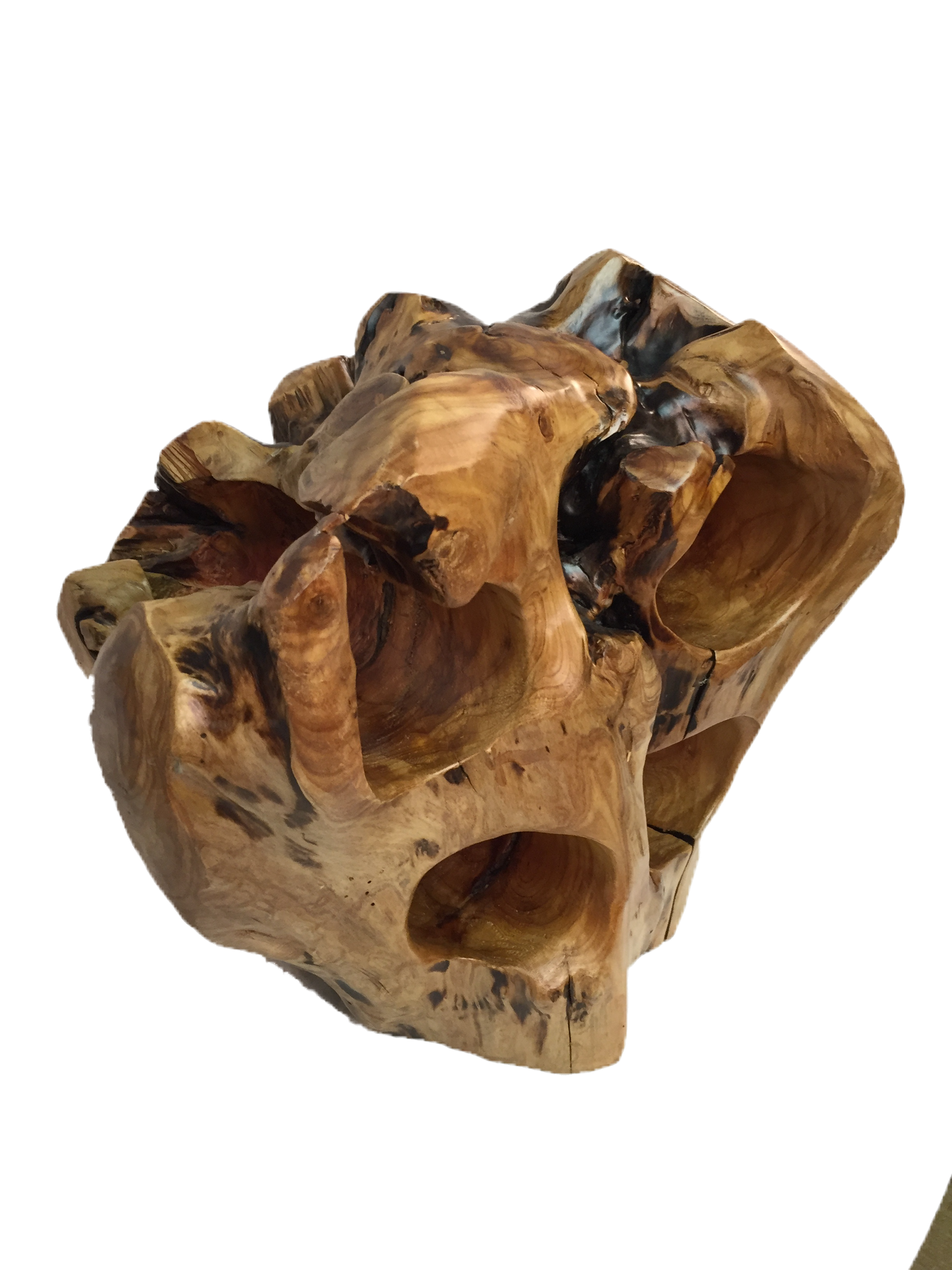 FUNCTIONAL ART is the best way to describe Greener Valley's stunning collection of stumps and roots that have been handcrafted into beautiful wine holders, cheese boards, platters, bowls and stools. Handcrafted from the roots and stumps of the Asian Cypress known as Shan Mu. These beautiful stools function equally well as a stool, end table or plant stand. Each piece is absolutely unique. This stool measures 24" high.