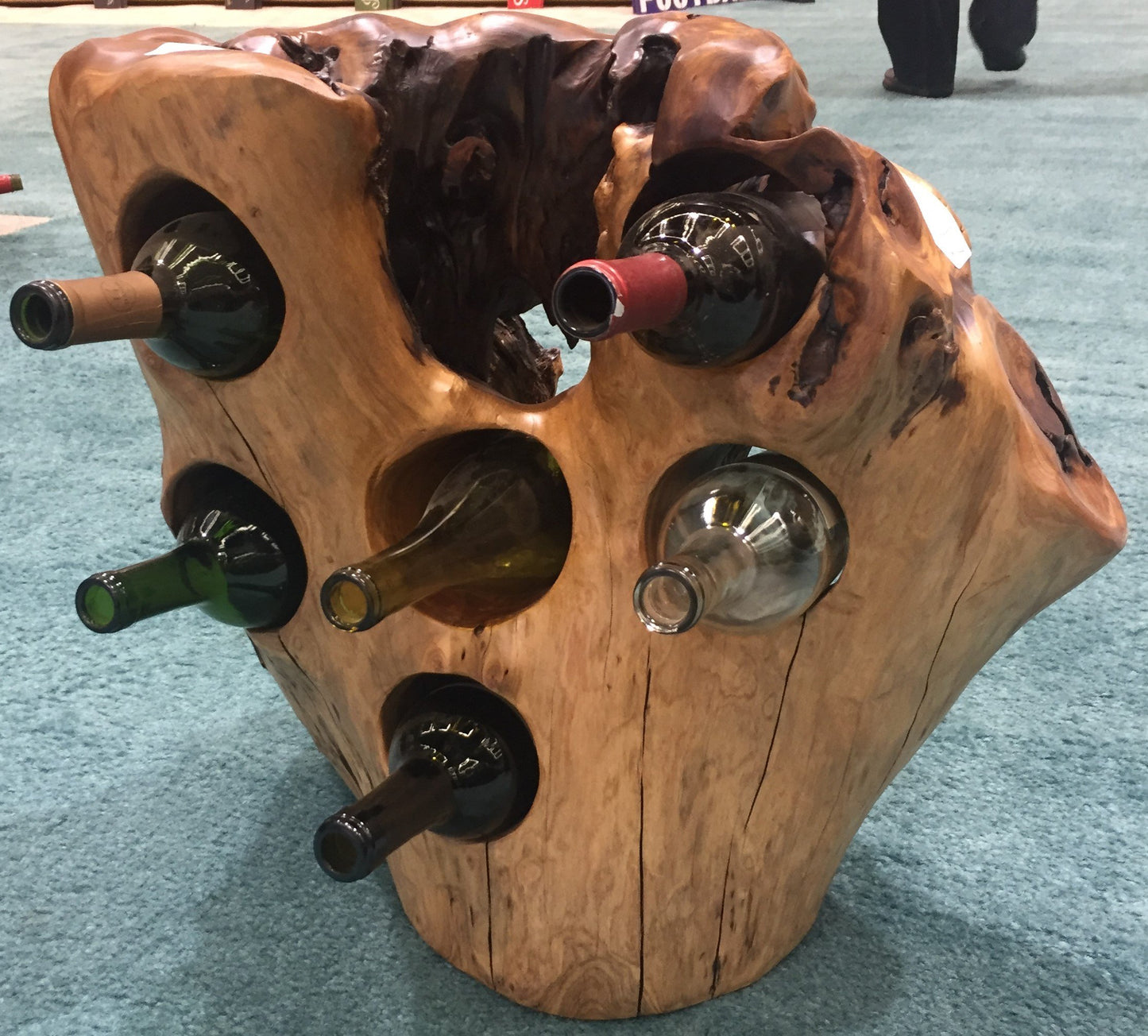 FUNCTIONAL ART is the best way to describe Greener Valley's stunning collection of stumps and roots that have been handcrafted into beautiful wine holders, cheese boards, platters, bowls and stools. Handcrafted from the roots and stumps of the Asian Cypress known as Shan Mu. These beautiful stools function equally well as a stool, end table or plant stand. Each piece is absolutely unique. This stool measures 24" high.
