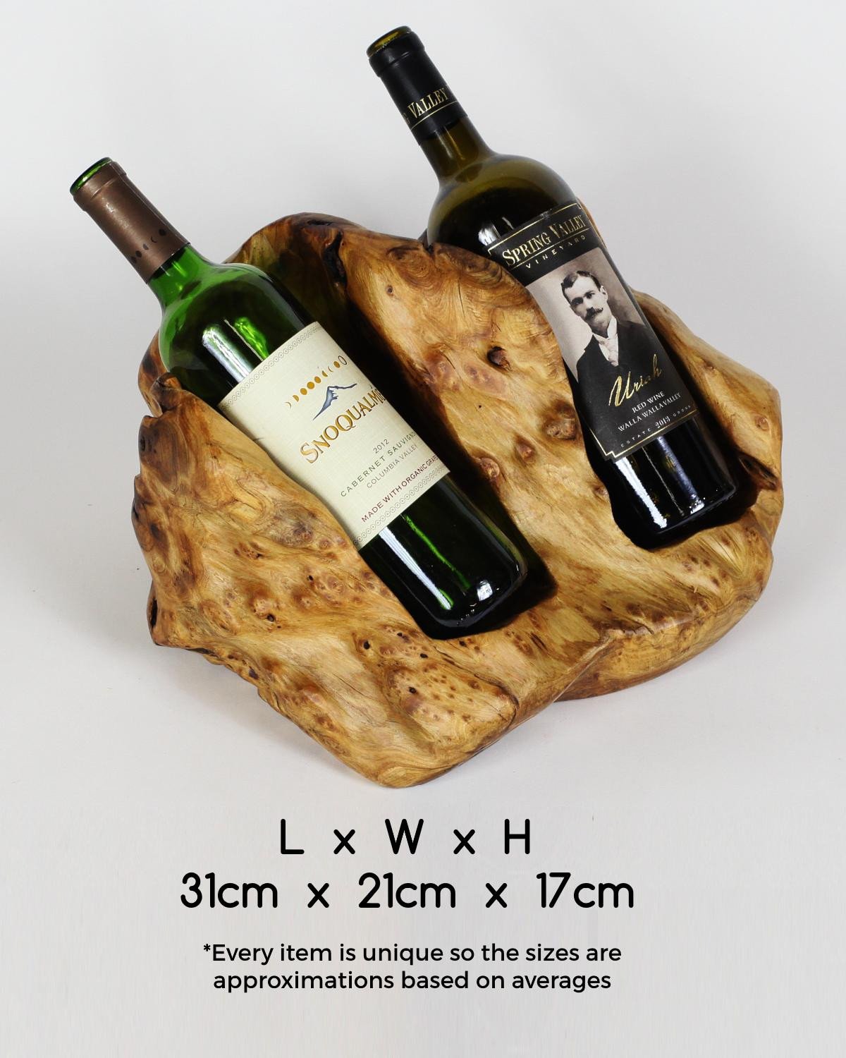 FUNCTIONAL ART is the best way to describe Greener Valley's stunning collection of stumps and roots that have been handcrafted into beautiful wine holders, cheese boards, platters, bowls and stools. Handcrafted from the roots and stumps of the Asian Cypress known as Shan Mu. These beautiful stools function equally well as a stool, end table or plant stand. Each piece is absolutely unique. This stool measures 24" high.